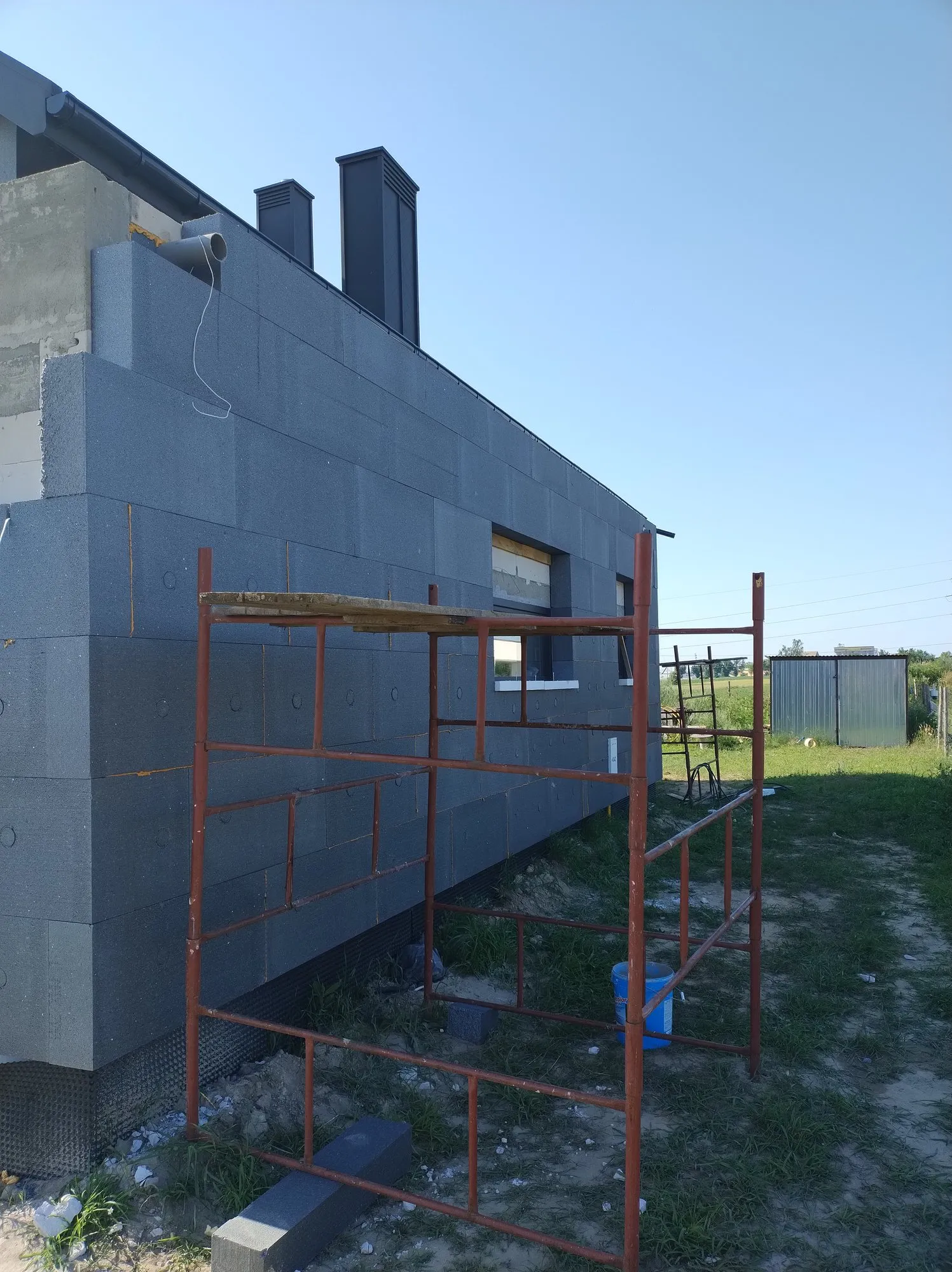 Płyty styropianu grafitowego na ścianie domu